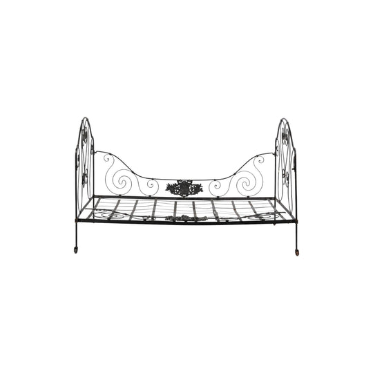 Beautiful and large daybed with lovely hand forged iron motifs from a hotel courtyard in Lyon