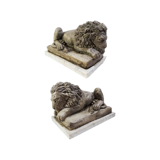 cast stone recumbent lions statues on marble bases