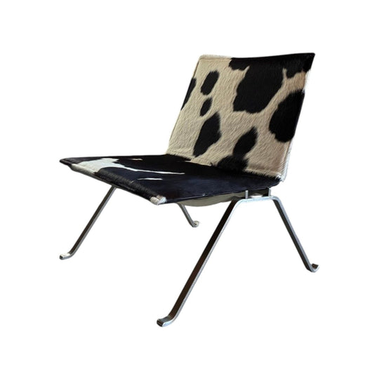 COWHIDE AND BRUSHED STEEL LOUNGE CHAIR