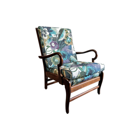 Curvaceous TV chair reupholstered in a floral print