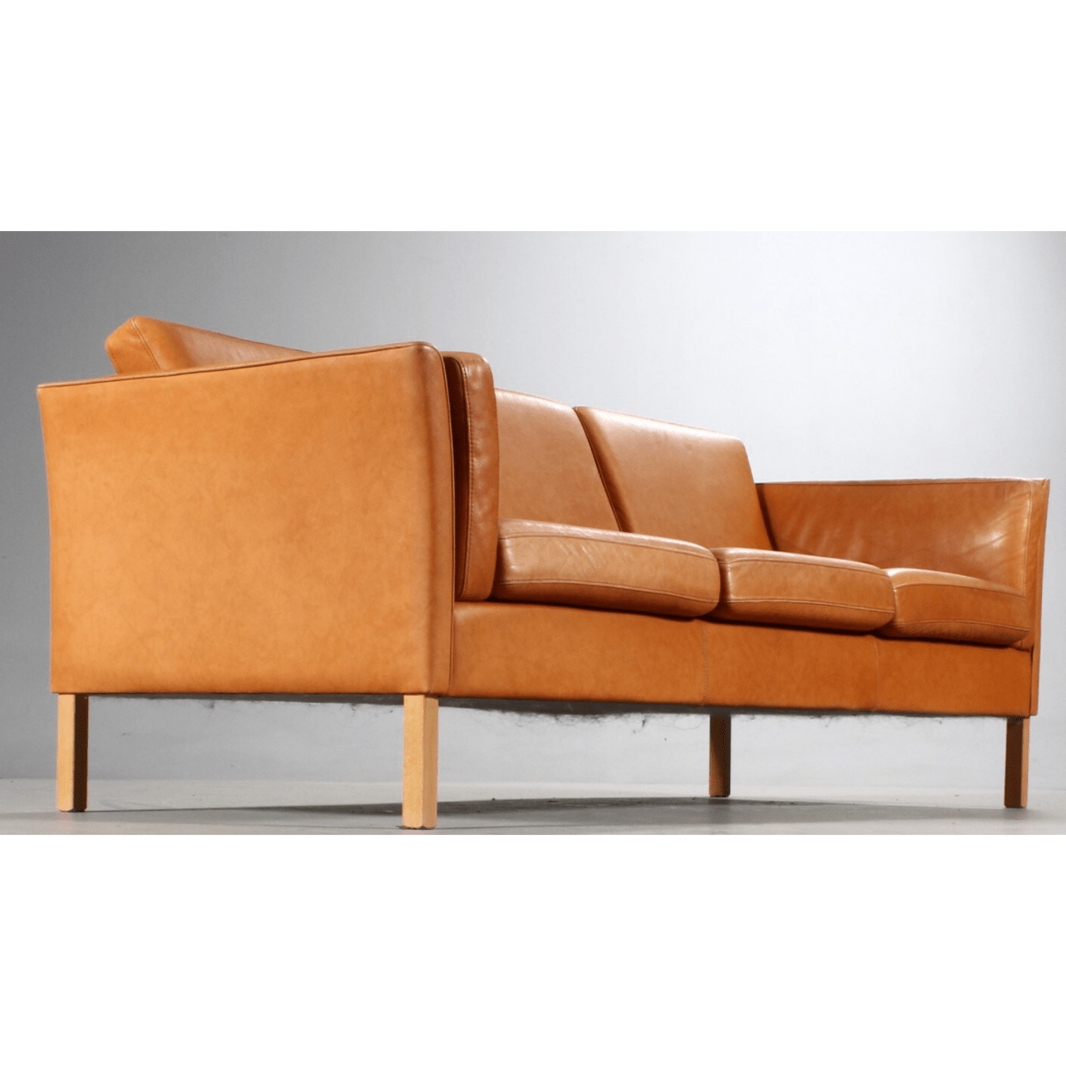 Danish furniture manufacturer. Three-seater sofa, cognac colored leather | Bazaa | Designer, Vintage and Antique Furniture