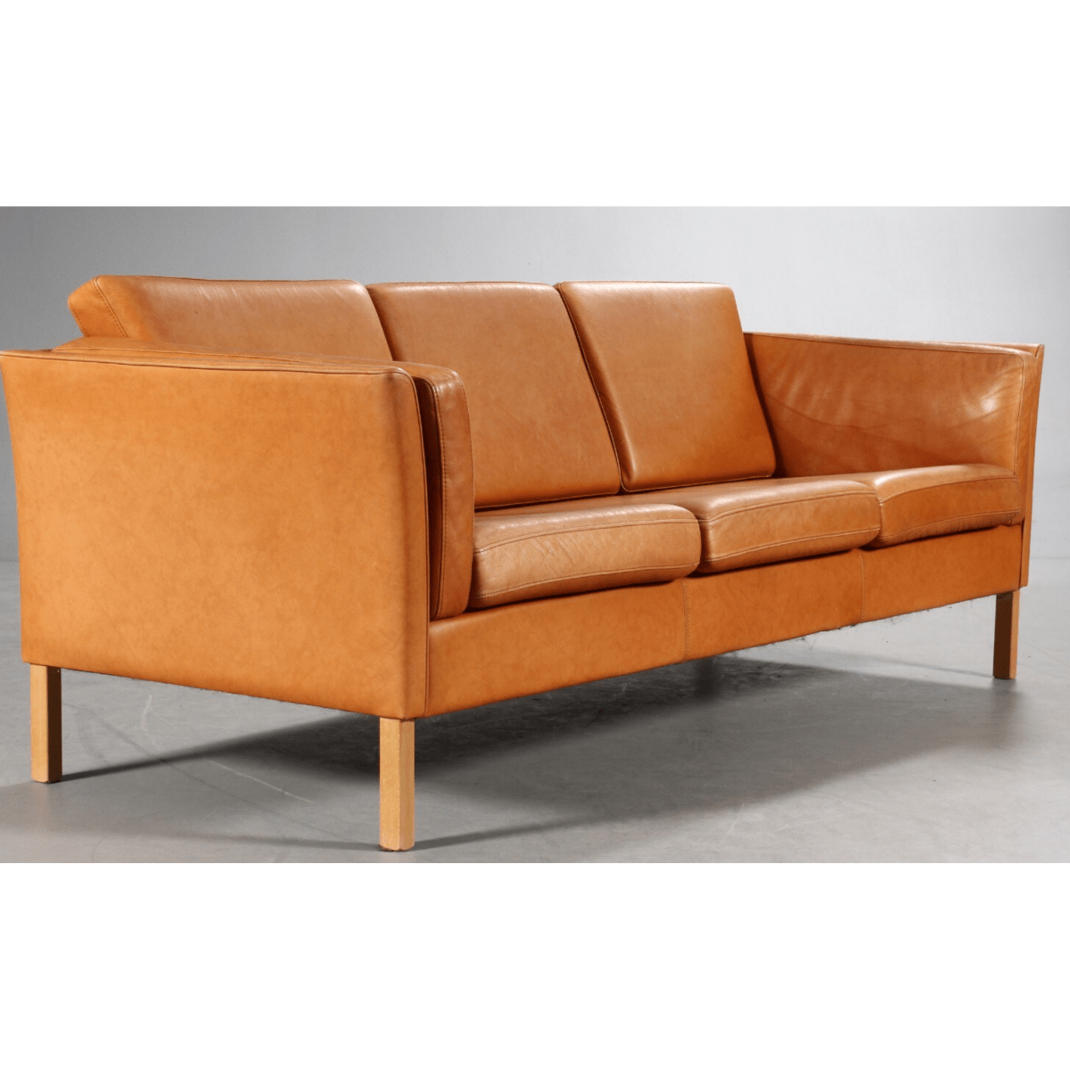 Danish furniture manufacturer. Three-seater sofa, cognac colored leather | Bazaa | Designer, Vintage and Antique Furniture