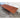 Fully extended DQF blackbean dining table seating approximately eight to ten people.