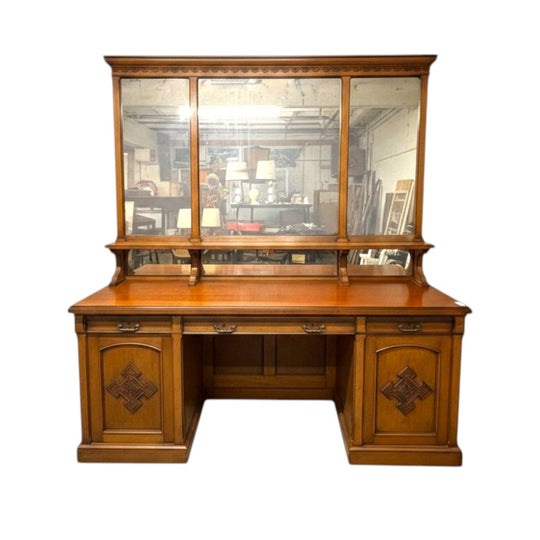 Edwardian oak sideboard with large mirror back and carved floral motifs