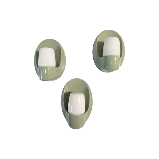 Extremely rare set of Sage Green Wilhelm Wagenfeld Ceramic Systral Wall Sconce