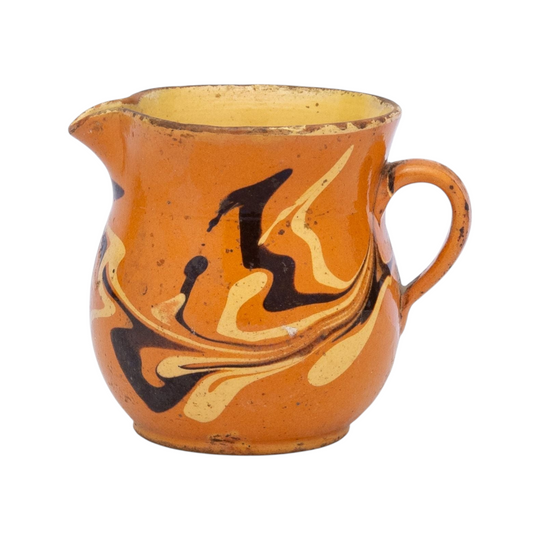 Vintage French glazed earthenware jug from the French Alps with marbled design