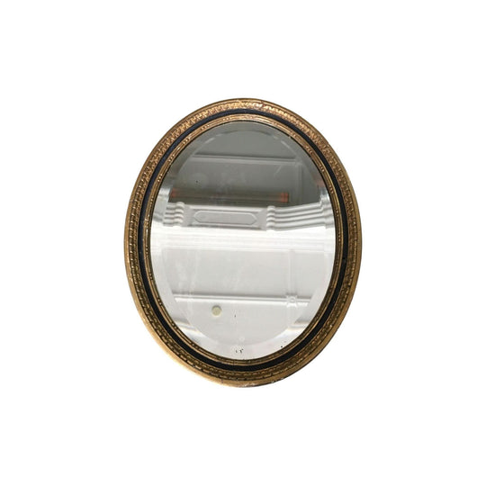 Gilt wood oval bevelled mirror, c. 1800