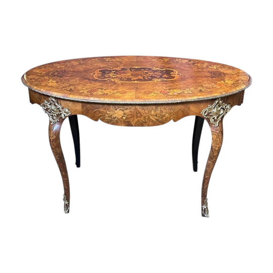 Fine quality French burr walnut oval centre table with marquetry inlays and ormolu mounts c.1870