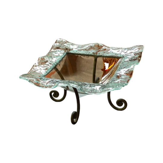 handmade wavy glass bowl on iron stand
