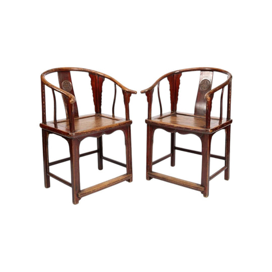 Horseshoe back armchairs