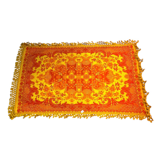Large orange and yellow patterned wool rug