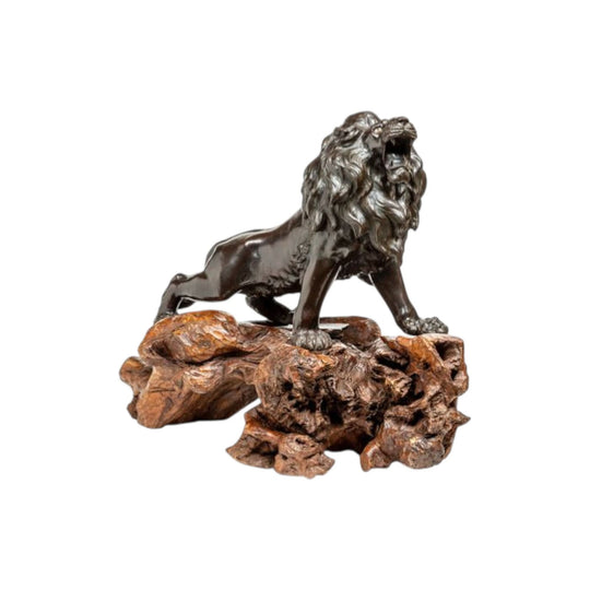 Japanese bronze figure of a prancing lion