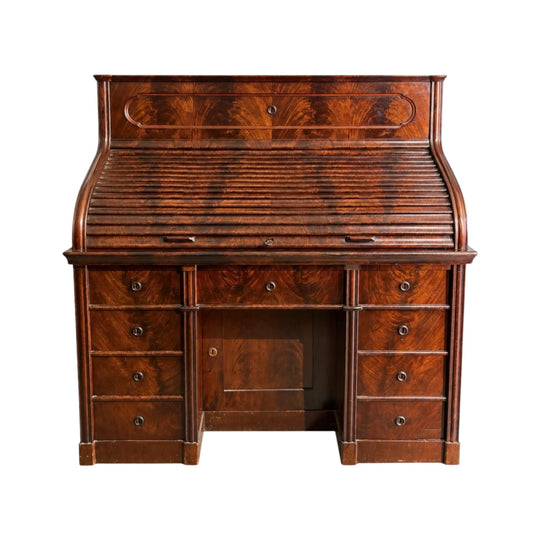 An Exceptional Biedermeier Flame Mahogany Roll-Top Desk