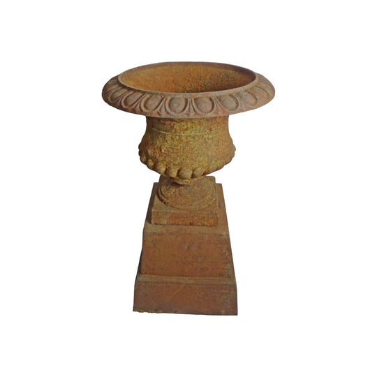 Large early cast iron garden urn on stand