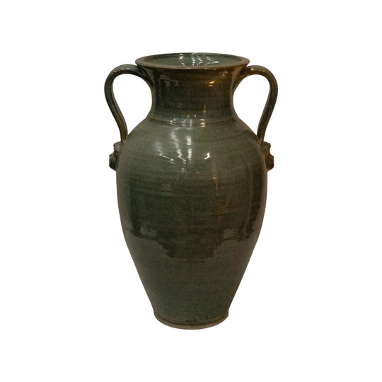 Large vase with handles and faces by Australian ceramicist Graeme Potter