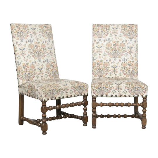 A Pair of Louis XIII Walnut and Upholstered Chairs