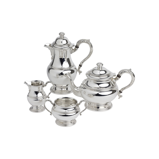 Sterling Silver Four Piece Tea Set by Goldsmiths and Silversmiths Co.