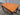 Angled view of the veneered tabletop and its timber grain.