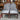 Pair from the set of six grey upholstered dining chairs