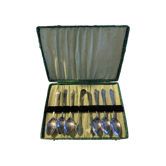 Vintage boxed chrome plated teaspoon and sugar tongs set. 7 pieces. High tea.