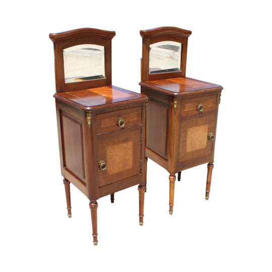 Pair of French inlaid bedside cabinets with mirrored backs