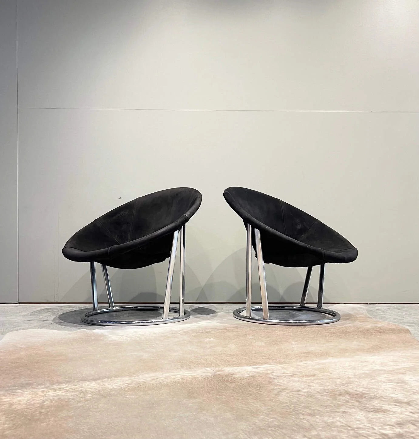 pair of chrome and leather lounge chairs vintage.jpg