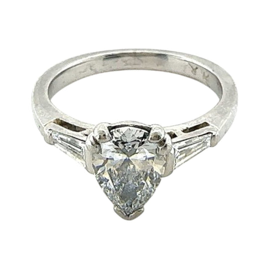 Platinum pear cut diamond solitaire ring with baguettes