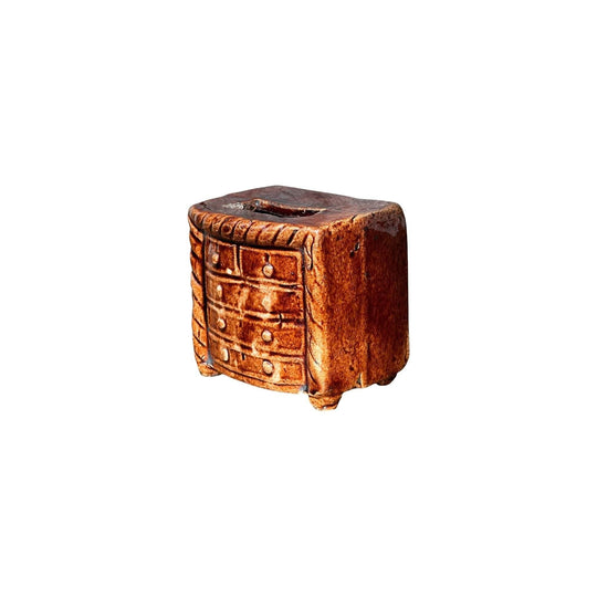 Pottery money box, 'Chest of Drawers' form, 'Rockingham' glaze, circa 1830