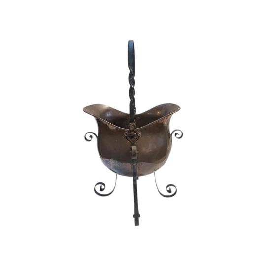 French helmet shaped copper jardiniere mounted in the original wrought iron stand