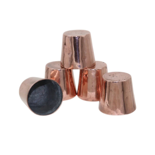 Set of five copper dariole moulds