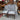 Set of six modern grey upholstered dining chairs, front view
