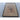 Low-angle view showing rippling to the artwork paper, spotting to the mount and wear along the lower black frame.