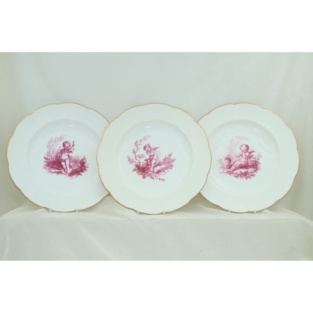 Three cherub decorated plates by Minton | Bazaa | Designer, Vintage and Antique Furniture