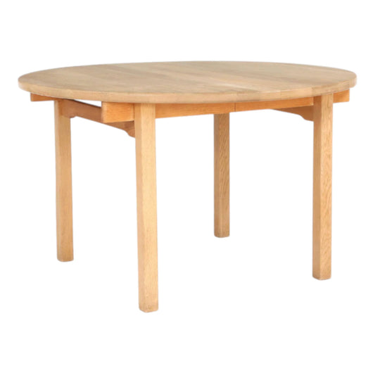 Børge Mogensen: Circular dining table of solid oak with extension and two extra leaves