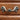 Vintage French chest of drawers with shaped front and brass handles. B12823 | Bazaa | Designer, Vintage and Antique Furniture