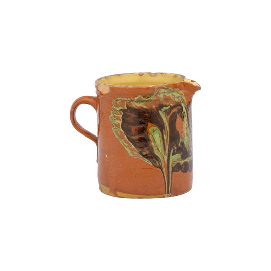 Vintage French glazed earthenware pitcher from the French Alps with marbled design