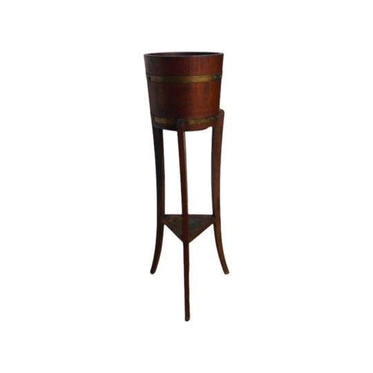 Vintage hardwood plant stand with brass-strapped barrel top