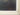 Close view of the signature within the image, surface creasing or lifting above it, and textured frame border.