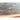 Close view of the artist’s painted signature on the lower section of the vintage oil painting.