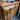 Open removable glass-topped drawer in a vintage specimen collector’s cabinet