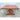 Vintage square timber coffee table with rounded edges and sculptural pedestal base.
