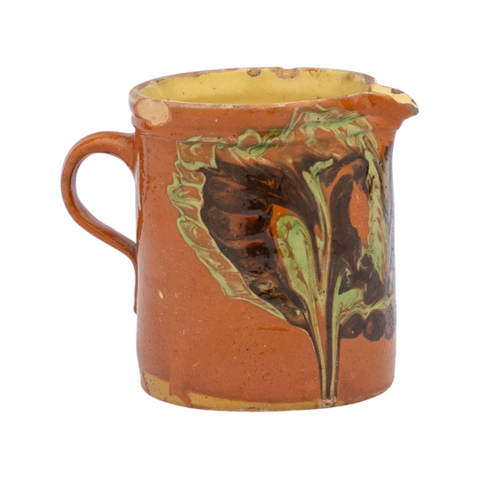 Vintage French glazed earthenware pitcher from the French Alps with marbled design